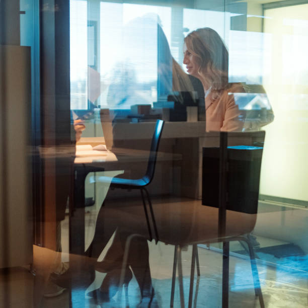 istock Abstract office workers in the meeting 1125742592