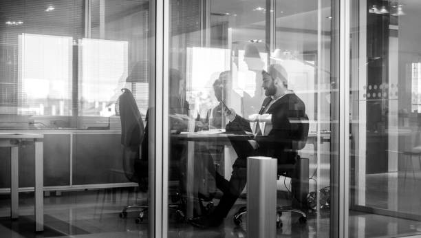 istock Abstract office workers in the meeting 1125743120
