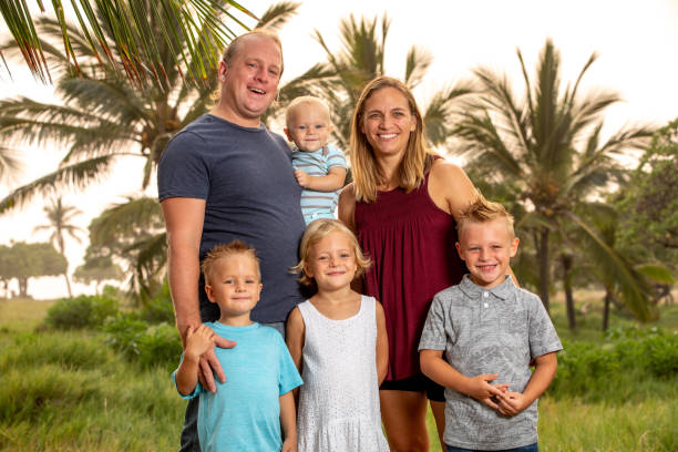 istock Family in Tropical Setting 1125744180