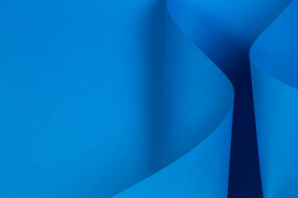 istock Abstract light blue paper background in geometric shapes 1125747901
