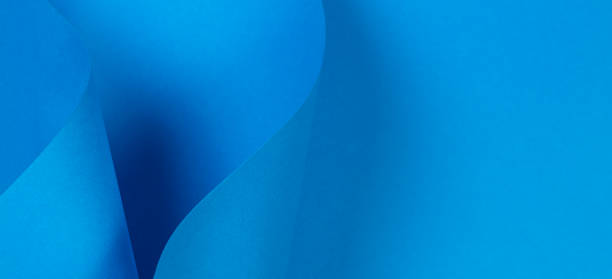 istock Abstract light blue paper background in geometric shapes 1125747943