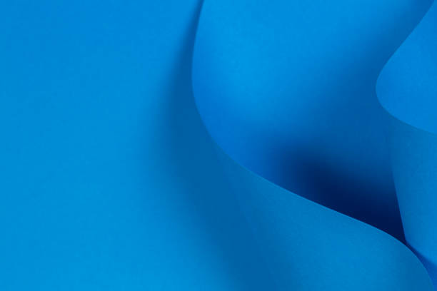 istock Abstract light blue paper background in geometric shapes 1125748103