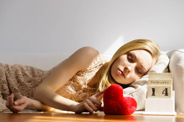 istock Sad woman on Valentines day 1125749582