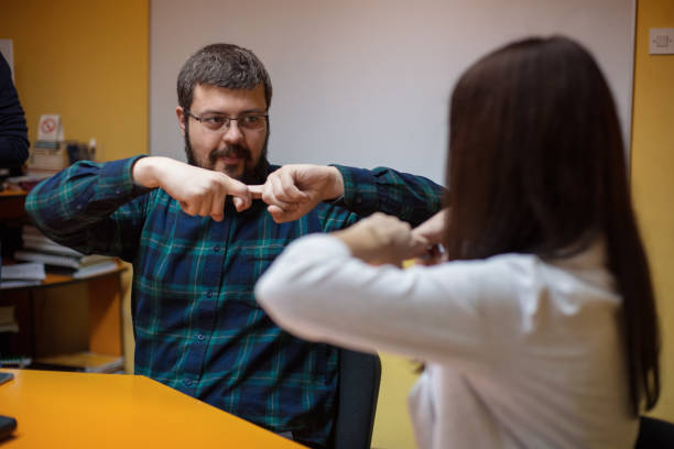 Teach In Sign Language 540+ Teaching American Sign Language Stock Photos, Pictures & Royalty ...