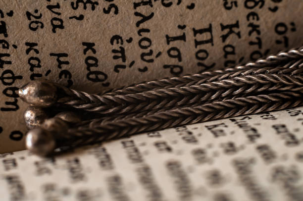 istock Silver worry beads on Greek New Tastement 1125750680