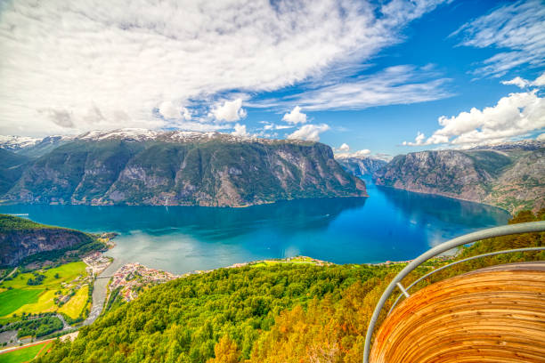Stegastein is a scenic overlook on Sogn og Fjordane County Road 243 in Norway. Stegastein is a scenic overlook on Sogn og Fjordane County Road 243 in Norway. he 30-metre (98 ft) long and 4-metre (13 ft) wide platform of steel and laminated pine overlooks Aurlandsvangen and the Aurlandsfjord stegastein viewpoint stock pictures, royalty-free photos & images
