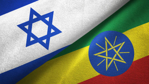 istock Ethiopia and Israel two flags together textile cloth, fabric texture 1125756708