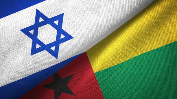 istock Guinea-Bissau and Israel two flags together textile cloth, fabric texture 1125756730