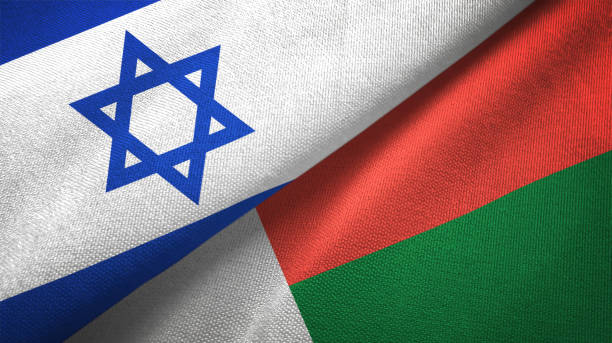 istock Madagascar and Israel two flags together textile cloth, fabric texture 1125756747