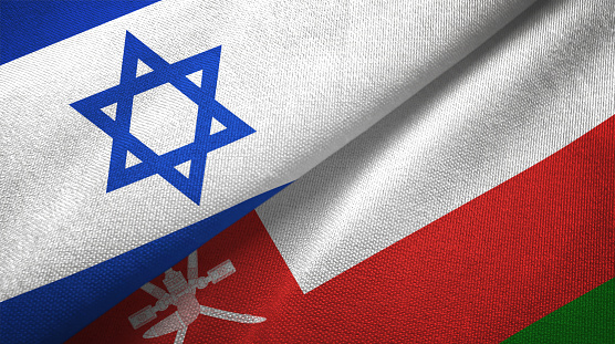 Oman and Israel flags together textile cloth, fabric texture