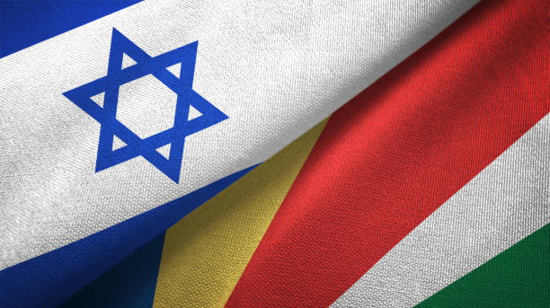 istock Seychelles and Israel two flags together textile cloth, fabric texture 1125756828