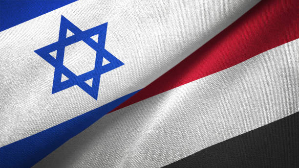 istock Yemen and Israel two flags together textile cloth, fabric texture 1125756853