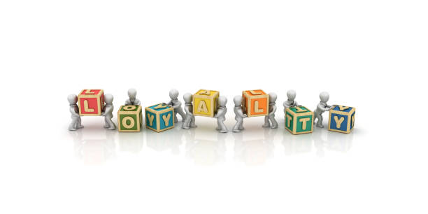 istock Business People Carrying LOYALTY Buzzword Cubes - 3D Rendering 1125756922
