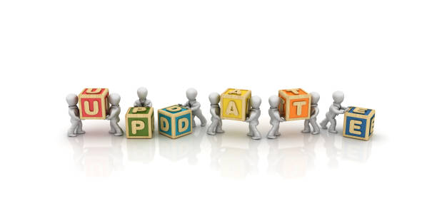 istock Business People Carrying UPDATE Buzzword Cubes - 3D Rendering 1125756937