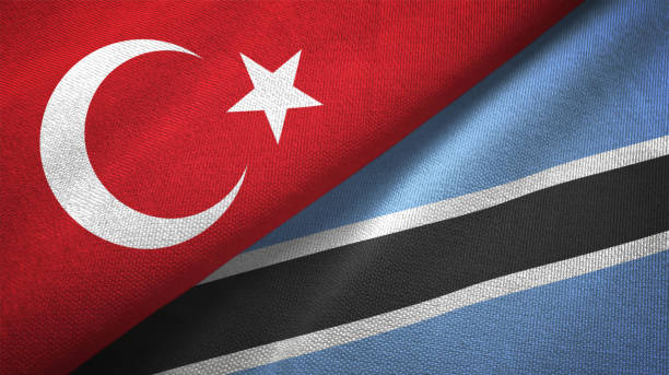 istock Botswana and Turkey two flags together textile cloth, fabric texture 1125757293
