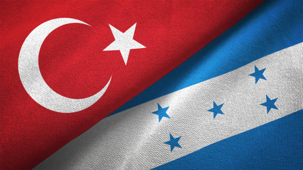 istock Honduras and Turkey two flags together textile cloth, fabric texture 1125757359
