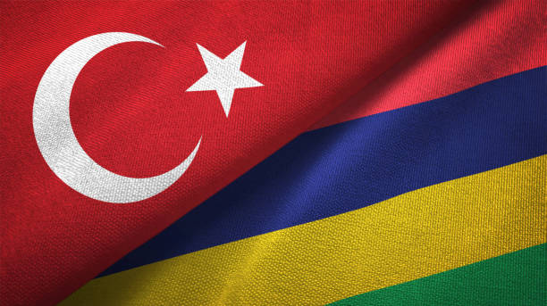 istock Mauritius and Turkey two flags together textile cloth, fabric texture 1125757380