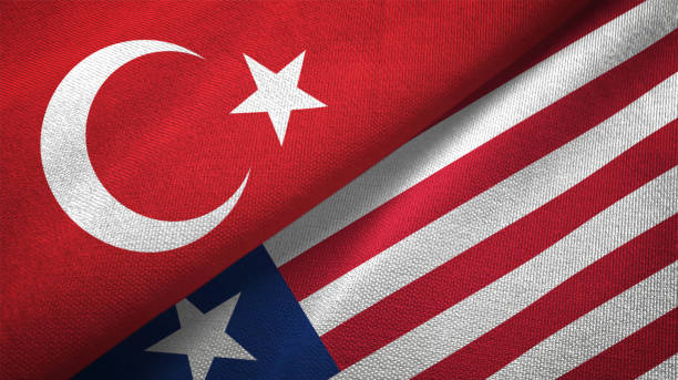 istock Liberia and Turkey two flags together textile cloth, fabric texture 1125757382