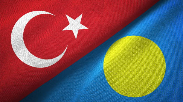 istock Palau and Turkey two flags together textile cloth, fabric texture 1125757915