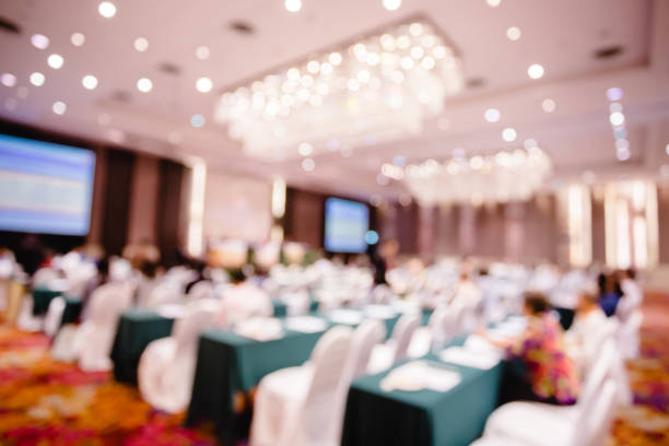 istock Blurry of auditorium and projector  for shareholders' meeting or seminar 1125758355