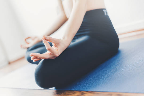 istock Young woman making yoga workout 1125758830