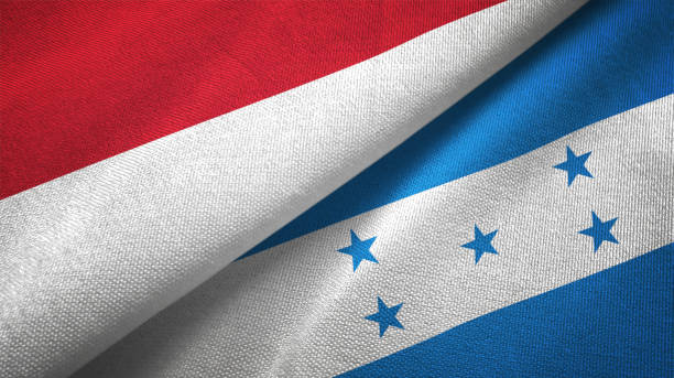 istock Honduras and Indonesia two flags together textile cloth, fabric texture 1125758895
