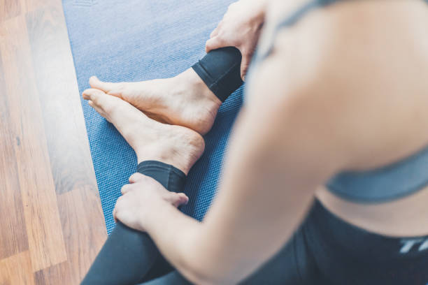 istock Young woman making yoga workout 1125758896