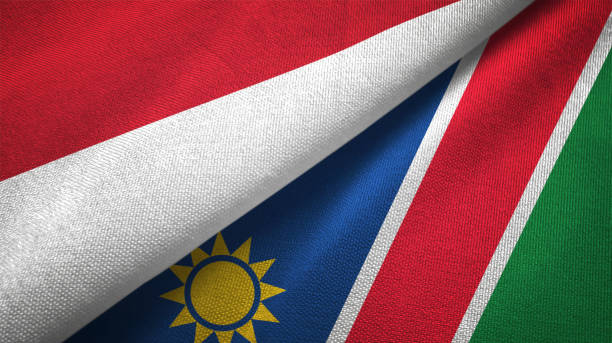 istock Namibia and Indonesia two flags together textile cloth, fabric texture 1125758938