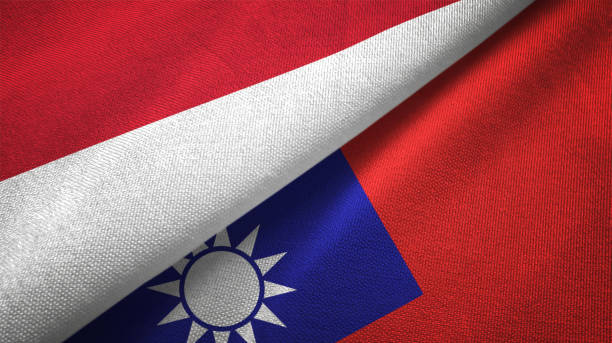 istock Taiwan and Indonesia two flags together textile cloth, fabric texture 1125758985