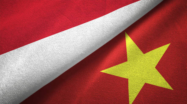 istock Vietnam and Indonesia two flags together textile cloth, fabric texture 1125759013