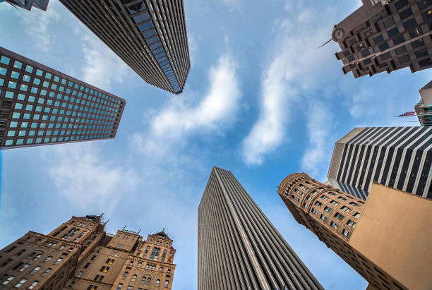 Highrises in San Francisco's Financial District, photographed from a low angle for dramatic perspective. Downtown of San Francisco look up, view up