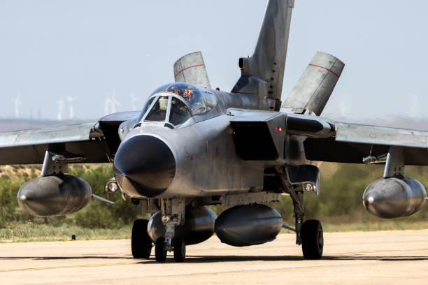 istock Fighter jet plane taxiing runway 1125759858