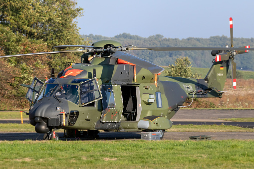 DEELEN, THE NETHERLANDS -OCT 11, 2018: German Army NH90 helicopter idle before take off on Deelen airbase.