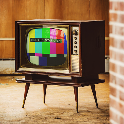 Old TV isolated on white background. Vintage television