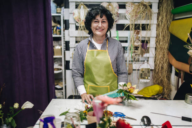istock Cheerful senior florist 1125764622