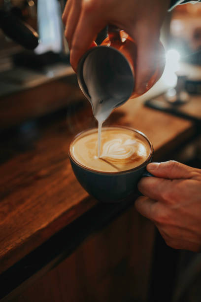 istock how to make latte art by Barista , bartender preparing coffee drink 1125768274