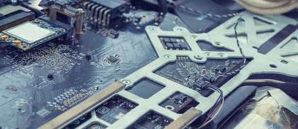 istock computer chip, repair and soldering of the scheme. 1125769017