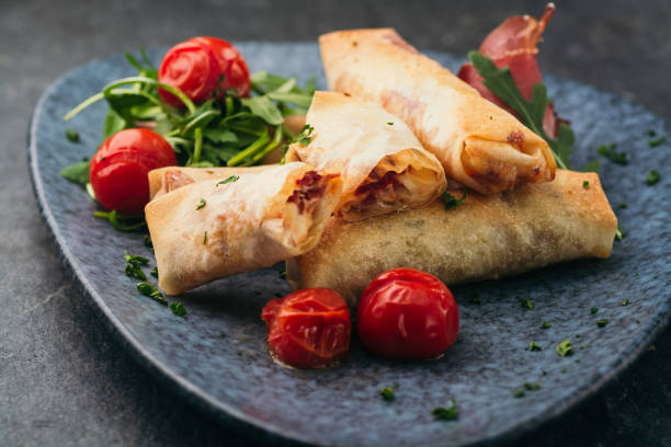 istock Spring rolls in a plate. Asian food concept 1125769512
