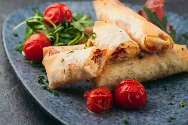 istock Spring rolls in a plate. Asian food concept 1125769519