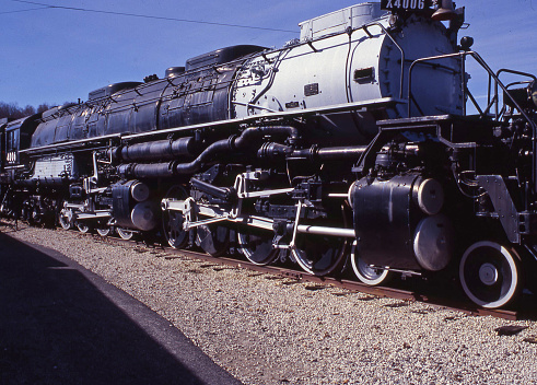 a vintage steam locomotive of the double boiler type