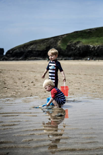 istock Child at the beach 1125772163