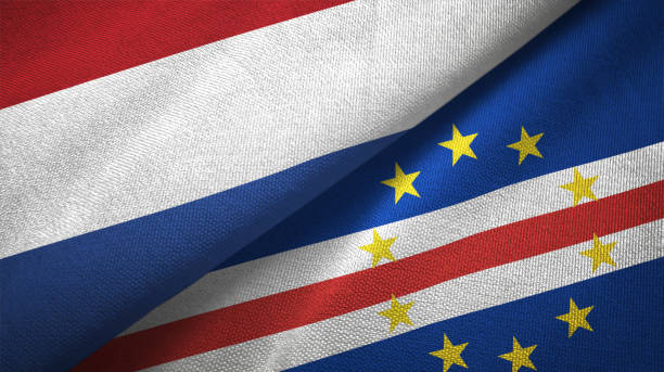 istock Cape Cabo Verde and Netherlands two flags together textile cloth, fabric texture 1125772757