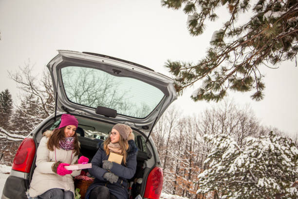 istock Young women give presents to one another 1125772785
