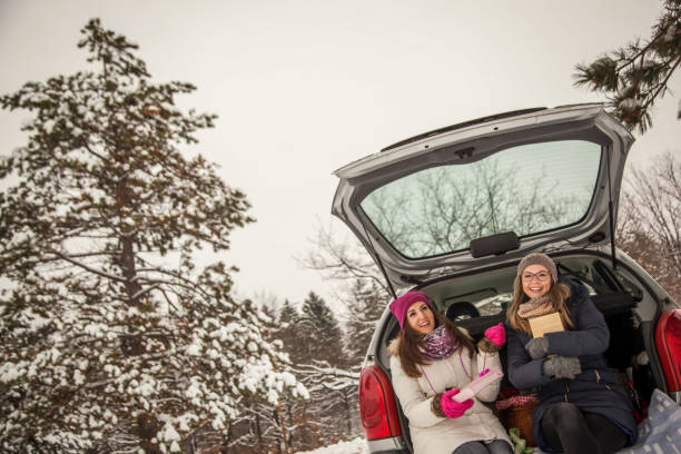 istock Young women give presents to one another 1125772912