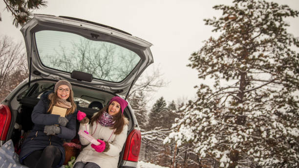 istock Young women give presents to one another 1125772938