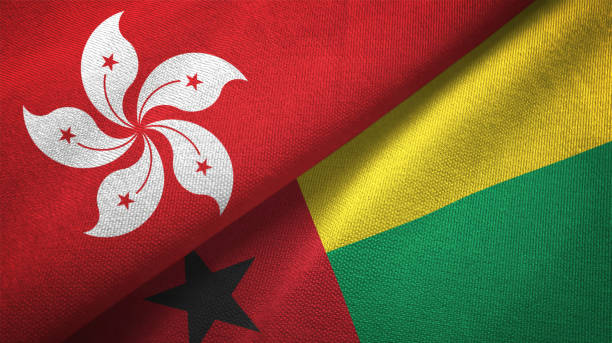 istock Guinea-Bissau and Hong Kong two flags together textile cloth, fabric texture 1125774544