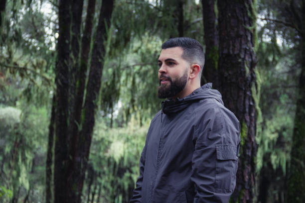 istock Young hipster in natural environment 1125777151