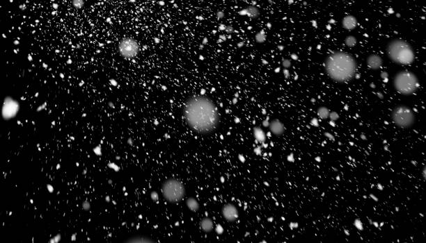 Snow texture on black background for overlay stock photo