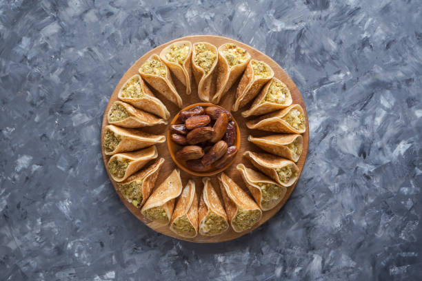 istock Traditional Arabic crepes stuffed with cream. 1125778231