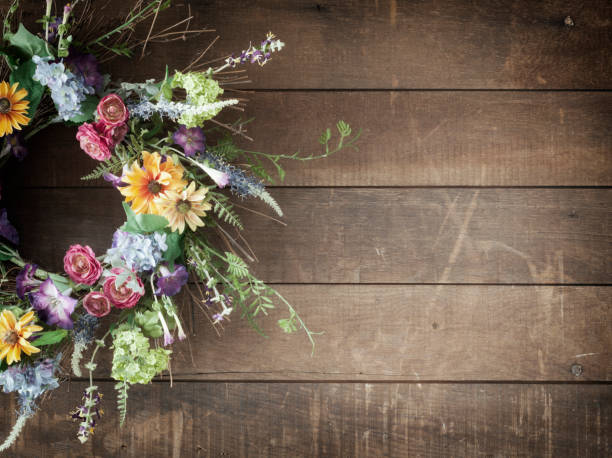 Easter spring flower wreath on an old wood background